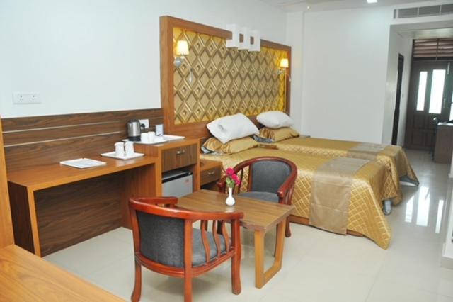 Kallada Mamatha Motels Kunnamkulam Buitenkant foto